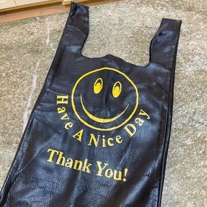 Black leather smiley face bag/purse/tote by Cast of Vices. Hand painted.